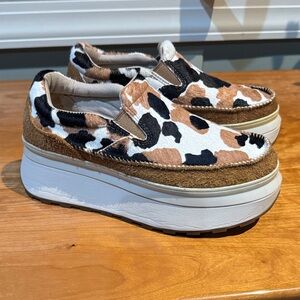The UGG Marin Slip On Cow Print shoes
